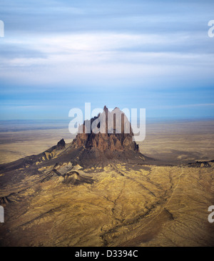 U.S.A., New Mexico, aerial view of the Shiprock rock formation, rising 482.5 metres above the high-desert plain Stock Photo
