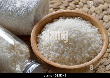 Close up of spa set with salt bath. Thermal spring bath salt with essential oil. Stock Photo