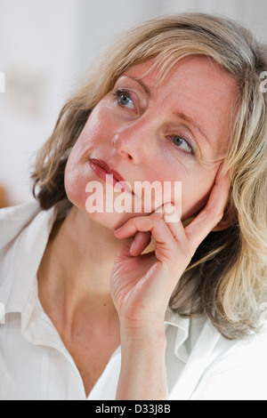 Woman looking thoughtfully