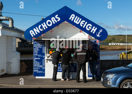 Fish and Chips shop at harbour West Bay, Bridport, Dorset, England UK Stock Photo