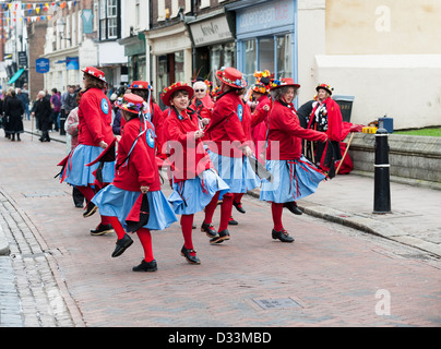 Black Horse and Standard Morris troop dancing in the Sweeps Festival in Rochester, Kent, UK Stock Photo