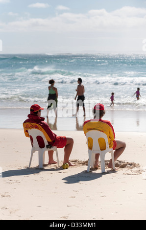 Lifeguards on duty at Cylinder Beach on North Stradbroke Island in Queensland, Australia Stock Photo