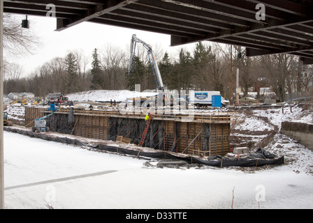 Placing retaining wall in Erie Canal. Stock Photo