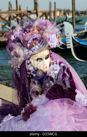Venice, Italy. 8th February 2013. Carnival goers take to the streets ...