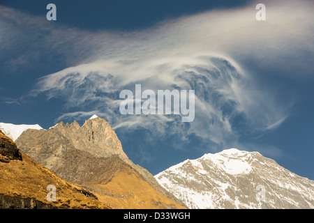 Jet stream winds over the Annapurna Himalayas in Nepal. Stock Photo