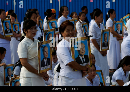 Cambodians Mourn the loss of King Norodom Sihanouk during a procession in his honor. Sisowath Quay Boulevard, Phnom Penh, Cambodia. credit: Kraig Lieb Stock Photo