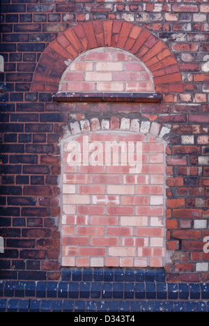 Bricked up window for security. Stock Photo