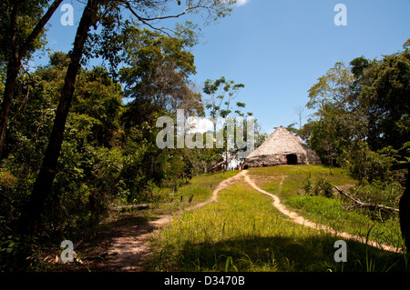 A Yagua maloca, traditional house with thatched roof, surroundings of Iquitos, Amazonian Peru Stock Photo