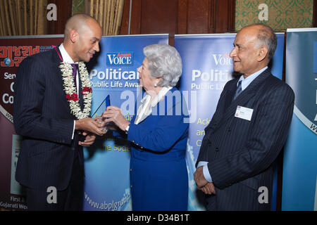 London, UK. 7th February 2013. On the right is Shadow Cabinet Secretary, Chuka Umunna, Member of Parliament being presented with an award for being The Shadow Cabinet Minister of the year by Guest of Honour, Baroness Betty Boothroyd, Former Speaker of the House of Commons at the Political and Public Life Awards 2013. On the right is C B Patel, Managing Director, Asian Voice newspaper. Stock Photo