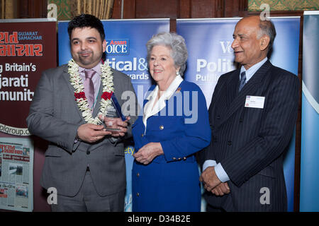 London, UK. 7th February 2013. On the right is Bobby Karia, Director for Whizzgroup of companies receiving an award as The Young Business Person of the Year from Guest of Honour, Baroness Betty Boothroyd, Former Speaker of the House of Commons at the Asain Voice Political and Public Life Awards 2013 held at the Member's Dining Room, House of Common, Westminster, London. On the right is C B Patel, Managing Director, Asian Voice newspaper in The UK. Stock Photo