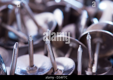 Close up photo of silver push pins Stock Photo