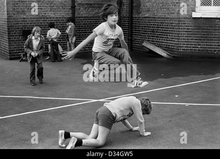 Playground games. South London junior school 1970s England  1975 HOMER SYKES Stock Photo