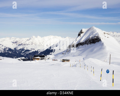 View from Les Grandes Platieres in Le Grand Massif ski area to Tete Pelouse peak and snowcapped mountains in French Alps. France Stock Photo