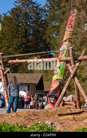 Raising of Wooch Jin Dul Shat Kooteeya – The Holding Hands Centennial Totem Pole in Sitka National Historical Park, Alaska, USA. Stock Photo