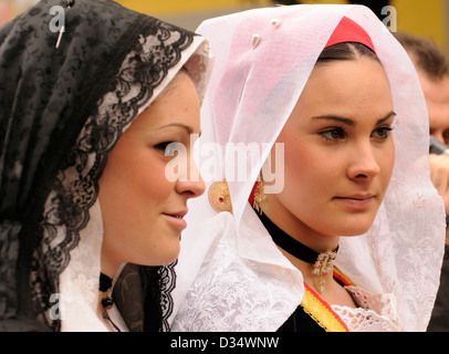 Sardinian girls wearing traditional dress at the Sartiglia parade,Oristano, Sardinia Stock Photo