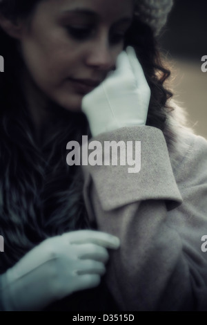 a woman in a pink coat Stock Photo