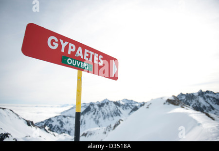 Marker for a red slope at La Mongie, skiing resort of the Grand Tourmalet area in the high Pyrenees, France Stock Photo