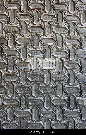 Old, vintage metal door background with abstract pattern. Stock Photo