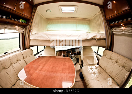 Alcove bed above drivers cab in Concorde luxury motorhome interior Stock Photo