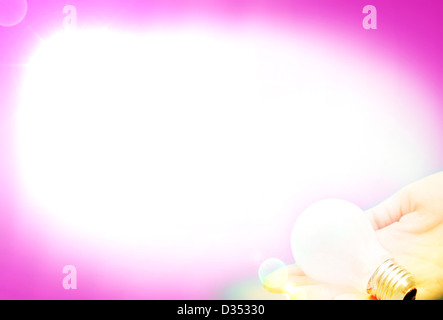Background with lit lightbulb. Isolated on pink. Stock Photo