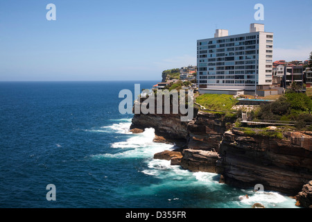 Brutalist architecture example of apartment building built on the foreshore of Diamond Bay Sydney Australia Stock Photo