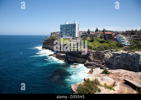 Brutalist architecture example of apartment building built on the foreshore of Diamond Bay Sydney Australia Stock Photo