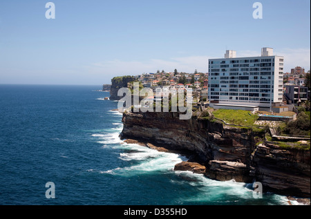 Brutalist architecture example of apartment building built on the foreshore of Diamond Bay Sydney Australia Stock Photo
