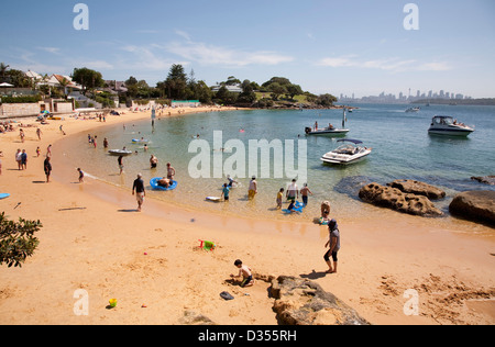 Summer holiday crowds swimming at Camp Cove a harbourside suburb near Watsons Bay Sydney Australia Stock Photo