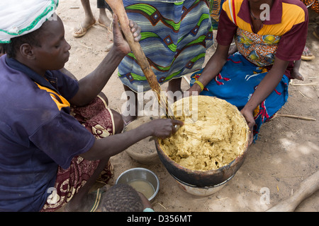 Barsalogho, Burkina Faso, May 2012: Village women making shea butter. Stock Photo