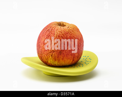 Close up of a wrinkly aged apple Stock Photo