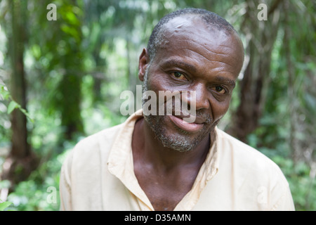 CAMEROON, 25th Sept 2012: Anonymous reformed poacher, formerly involved in the ivory trade, now an illegal logger. Stock Photo