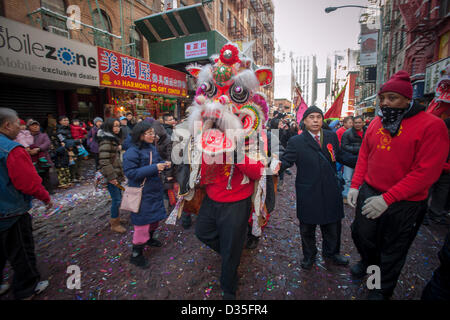 New York, USA. 10th Feb, 2013. Tourists and New Yorkers of all races and nationalities crowd Chinatown in New York for the annual Chinese Lunar New Year festivities on Sunday, February 10, 2013. The gala features dragon dancing troupes and other festivities ushering in the Year of the Snake, 4711 in the Lunar calendar.  Credit:  Richard B. Levine/Alamy Live News) Stock Photo