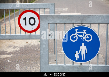 10 mph speed limit and cycling and pedestrian route signs at Avon Beach, Mudeford, Christchurch, Dorset UK Stock Photo