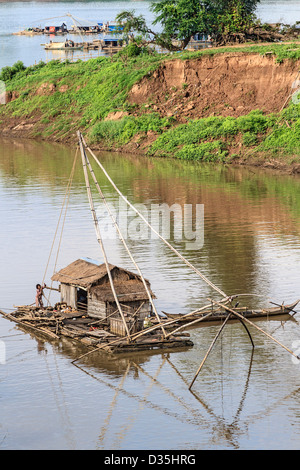 Floating Vietnamese houseboats on the Mekong River in Kratie, Cambodia. Stock Photo