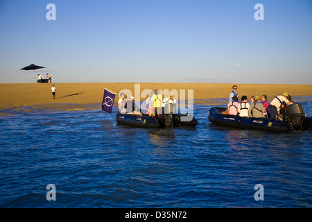 Passengers from the Aussie expedition cruiser Orion are treated to refreshments, Montgomery Reef, Collier Bay, Western Australia Stock Photo