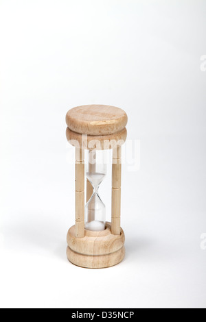 Wooden hourglass timer on a white background Stock Photo