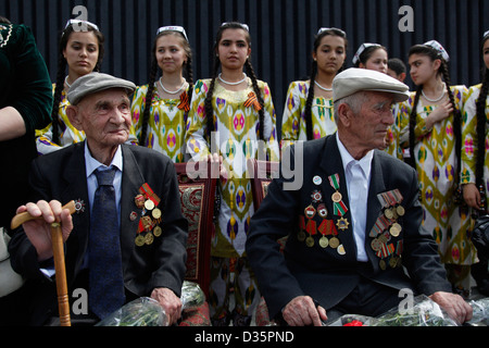 Tajik veterans and families at a Soviet Veteran's day celebration in ...