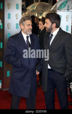 London, UK. 10th February 2013. Director Ben Affleck (r) and producer George Clooney arrive at the EE British Academy Film Awards at The Royal Opera House in London. Photo: Hubert Boesl/dpa/Alamy Live News Stock Photo
