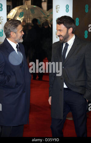 London, UK. 10th February 2013. Director Ben Affleck (r) and producer George Clooney arrive at the EE British Academy Film Awards at The Royal Opera House in London. Photo: Hubert Boesl/dpa/Alamy Live News Stock Photo