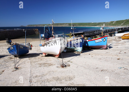 Fishing boats in the small harbour at Sennen Cove, Cornwall. Stock Photo