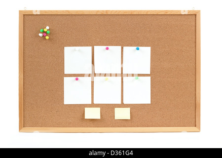 four empty note papers on cork board Stock Photo