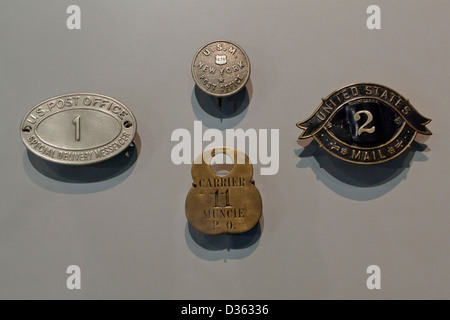 Vintage letter carrier badges Stock Photo