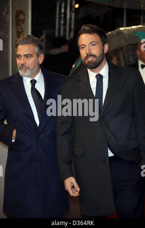 Director Ben Affleck (r) and producer George Clooney arrive at the EE British Academy Film Awards at The Royal Opera House in London, England, on 10 February 2013. Photo: Hubert Boesl Stock Photo