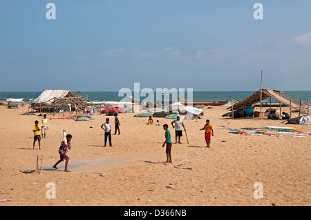 Cricket on the beach of Fishing Port Village Chennai ( Madras ) India Tamil Nadu Stock Photo