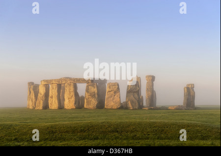 stonehenge throught the mist at sunrise Stock Photo
