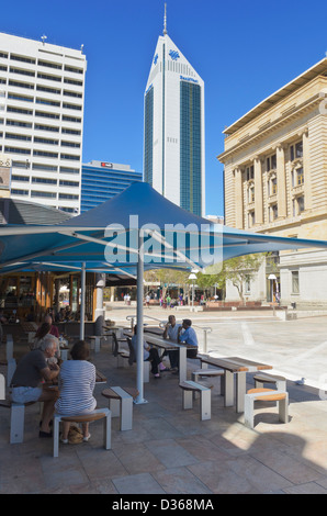 Large shade umbrellas over seating for people in Forrest Place, Perth, Western Australia Stock Photo