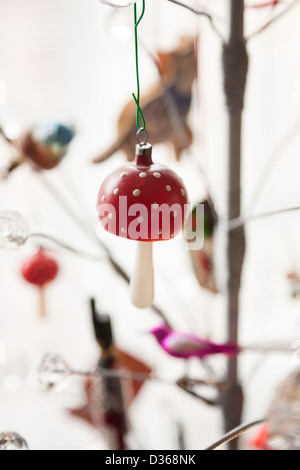 Christmas Ornaments on Modern Holiday Tree Stock Photo