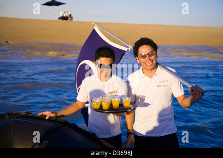 Passengers from the Aussie expedition cruiser Orion are treated to refreshments, Montgomery Reef, Collier Bay, Western Australia Stock Photo