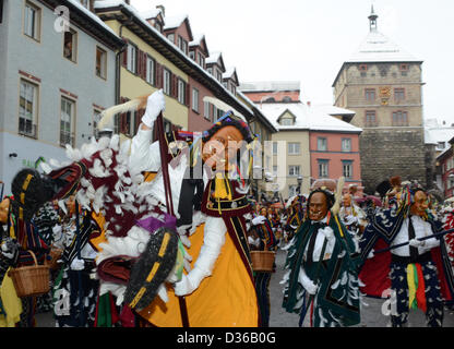 Rottweil, Germany. 11th February 2013. Carnival revelers celebrate in Rottweil, Germany, 11 February 2013. About 4000 participants move through the inner city at the street carnival 'Rottweiler Narrensprung', one of the traditional highlights of the Swabian carnival in the southwest. Photo: Patrick Seeger/dpa/Alamy Live News