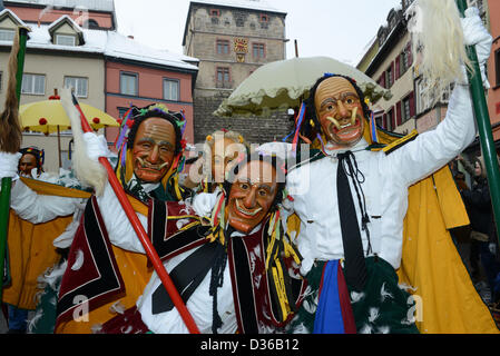 Rottweil, Germany. 11th February 2013. Carnival revelers pose for the photographer in Rottweil, Germany, 11 February 2013. About 4000 participants move through the inner city at the street carnival 'Rottweiler Narrensprung', one of the traditional highlights of the Swabian carnival in the southwest. Photo: Patrick Seeger/dpa/Alamy Live News Stock Photo